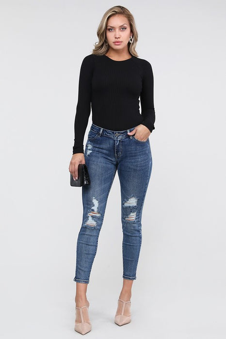 MID RISE RIPPED STRETCH SKINNY JEANS
